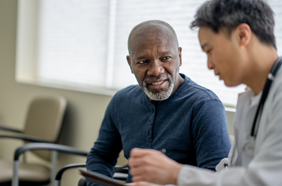 Doctor speaking with a patient