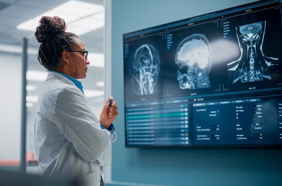 Doctor examining patient scans